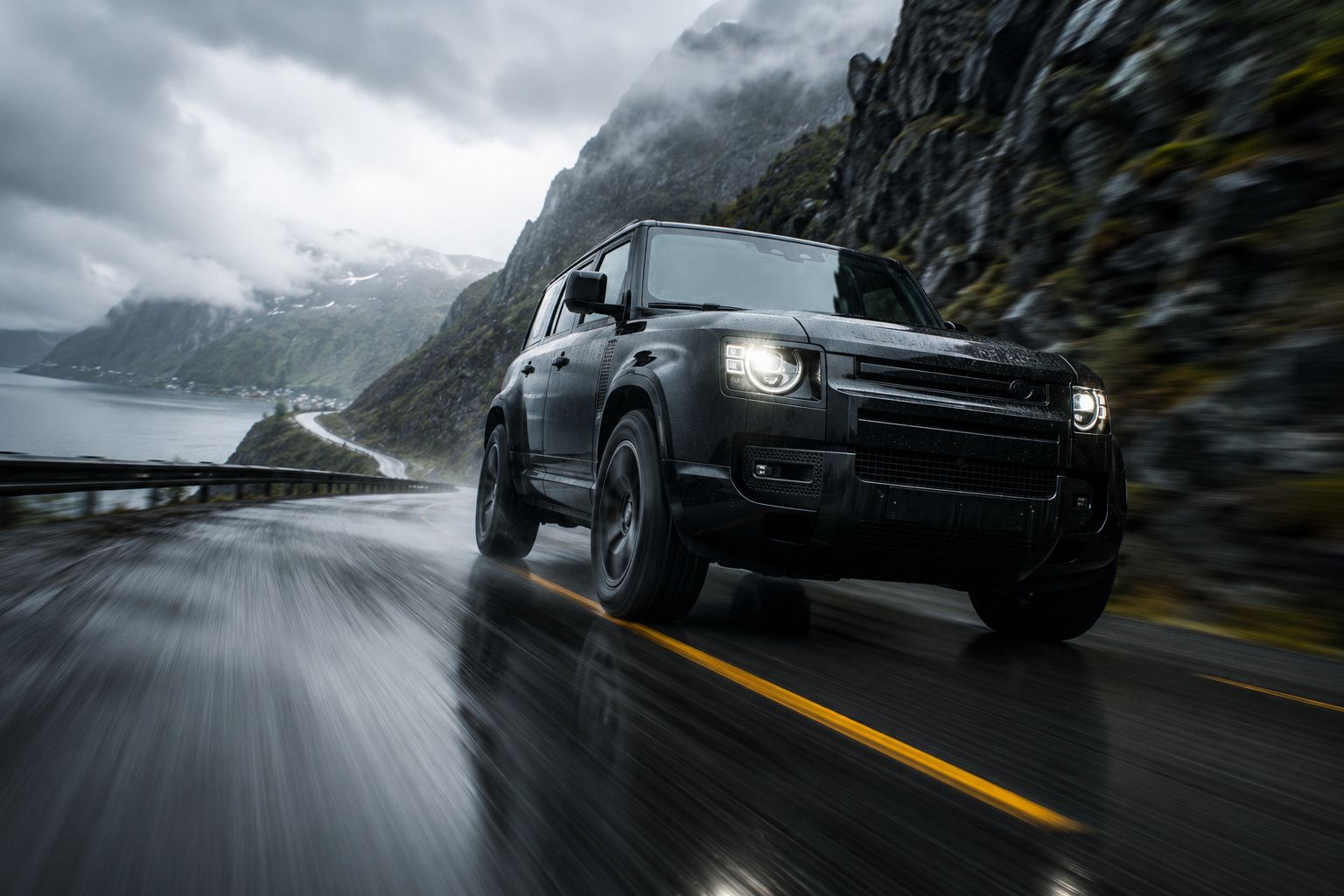 SUV on a wet mountain road